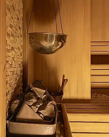 Skilled attendant providing personalized exfoliation and foam massage services at Ametyhst Turkish Bath
